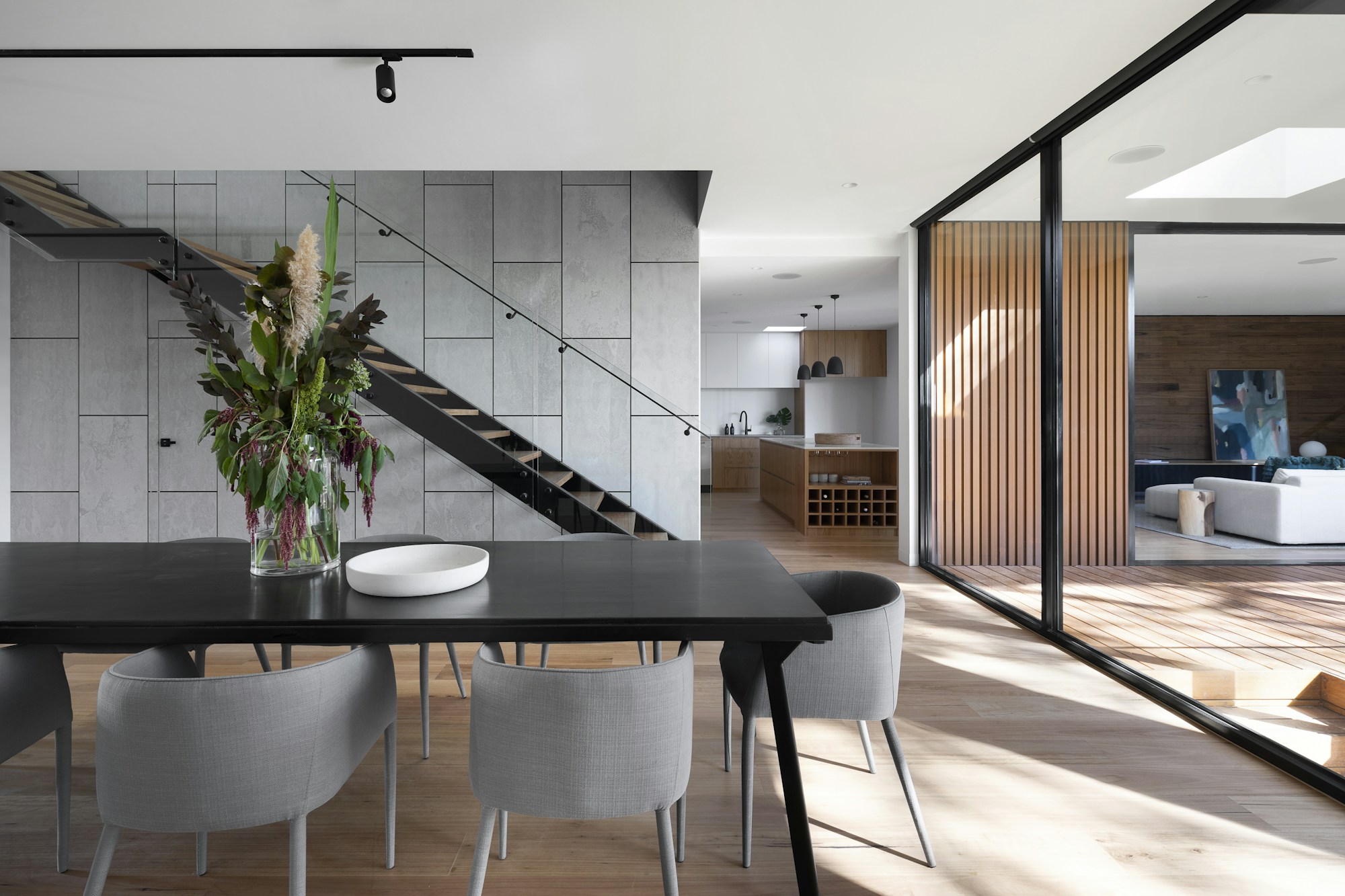 Light-filled neutral living room with natural textures and contemporary furnishings